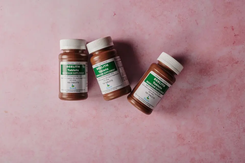 Close-up of a pet supplement label next to certificate-of-analysis paperwork
