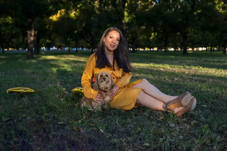 Older dog with an owner in a park
